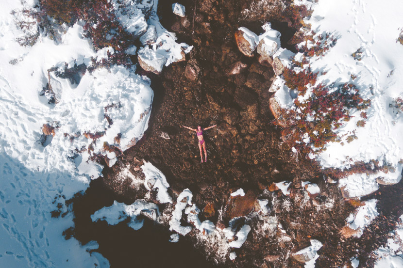 Woman swimming in cold water